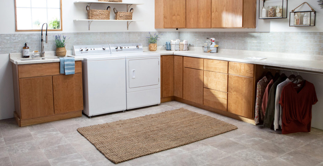 photo of a laundry room with a sink and washer and dryer